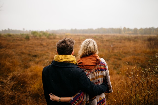 couple, hug, together, winter clothes, winter clothing, warm clothes, pair, lovers, nature, grass, outdoor, field, people, man, woman, dating